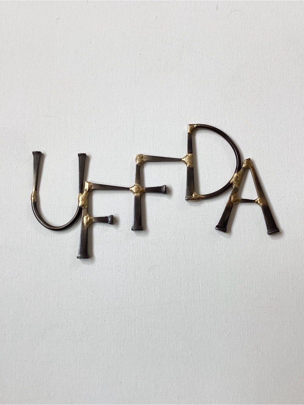 Metal Uffda Sign